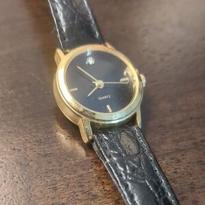 Gold and Black Leather Strap Watch